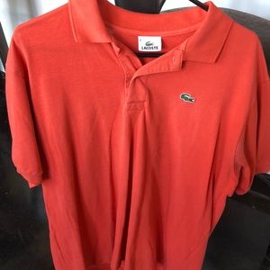 Men’s Lacoste Polo. Orange lightly worn